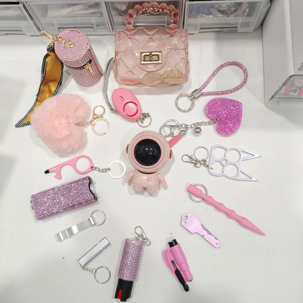 16-piece Astronaut Fan Keychain Set - Premium self defense keychain set for women's personal safety. Features Multiple defense tools and Comprehensive protection.