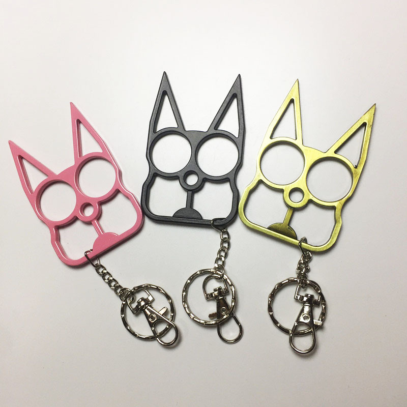 Justice black cat with two fingers - Premium self defense keychain set for women's personal safety. Features Keychain attachment and Durable construction.