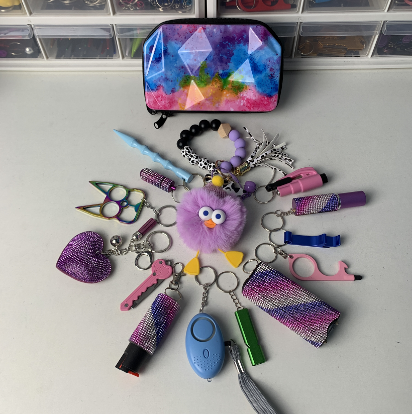 New Handbag Shiny 16pcs Keychain Set - Premium self defense keychain set for women's personal safety. Features 16-piece comprehensive set and Multiple defense tools.