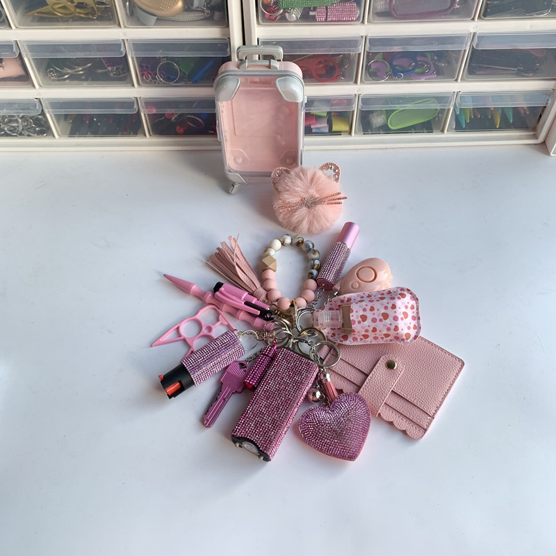 Shiny Lightning Keychain 15pcs Keychain Set - Premium self defense keychain set for women's personal safety. Features 15-piece comprehensive set and Multiple defense tools.